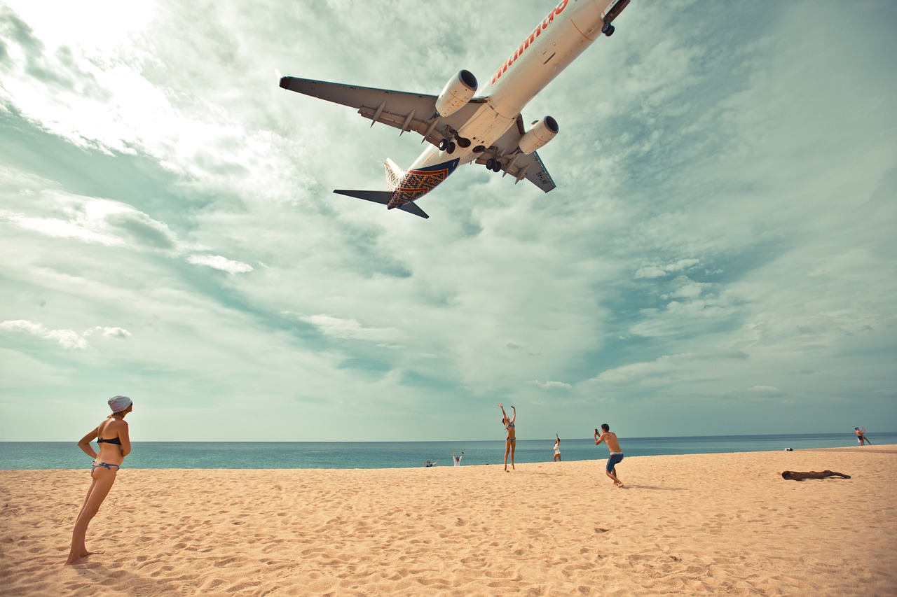 Aircraft landing above the beach in Phuket, Thailand