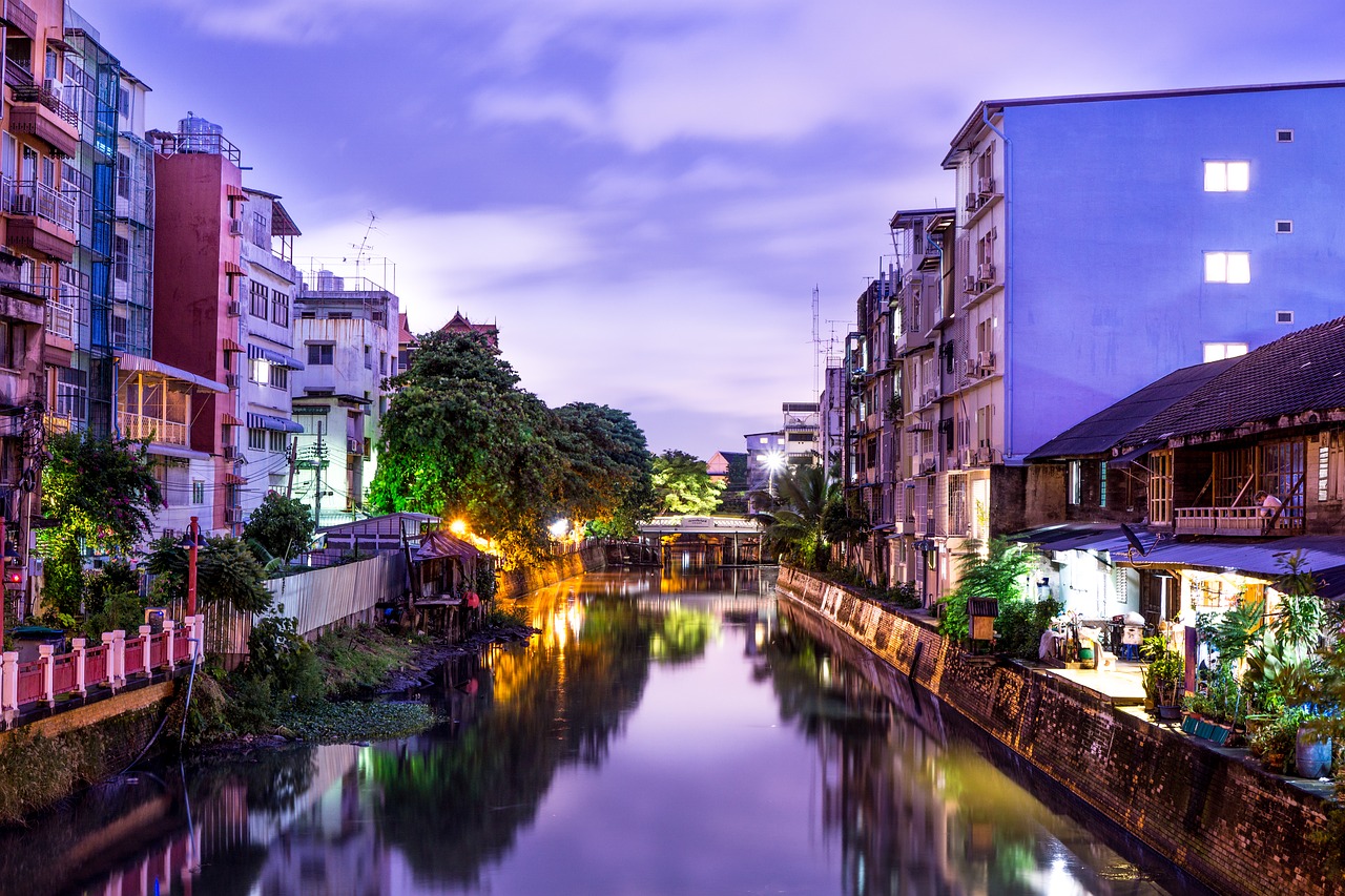 Condominium buildings on the river in Nonthaburi at night