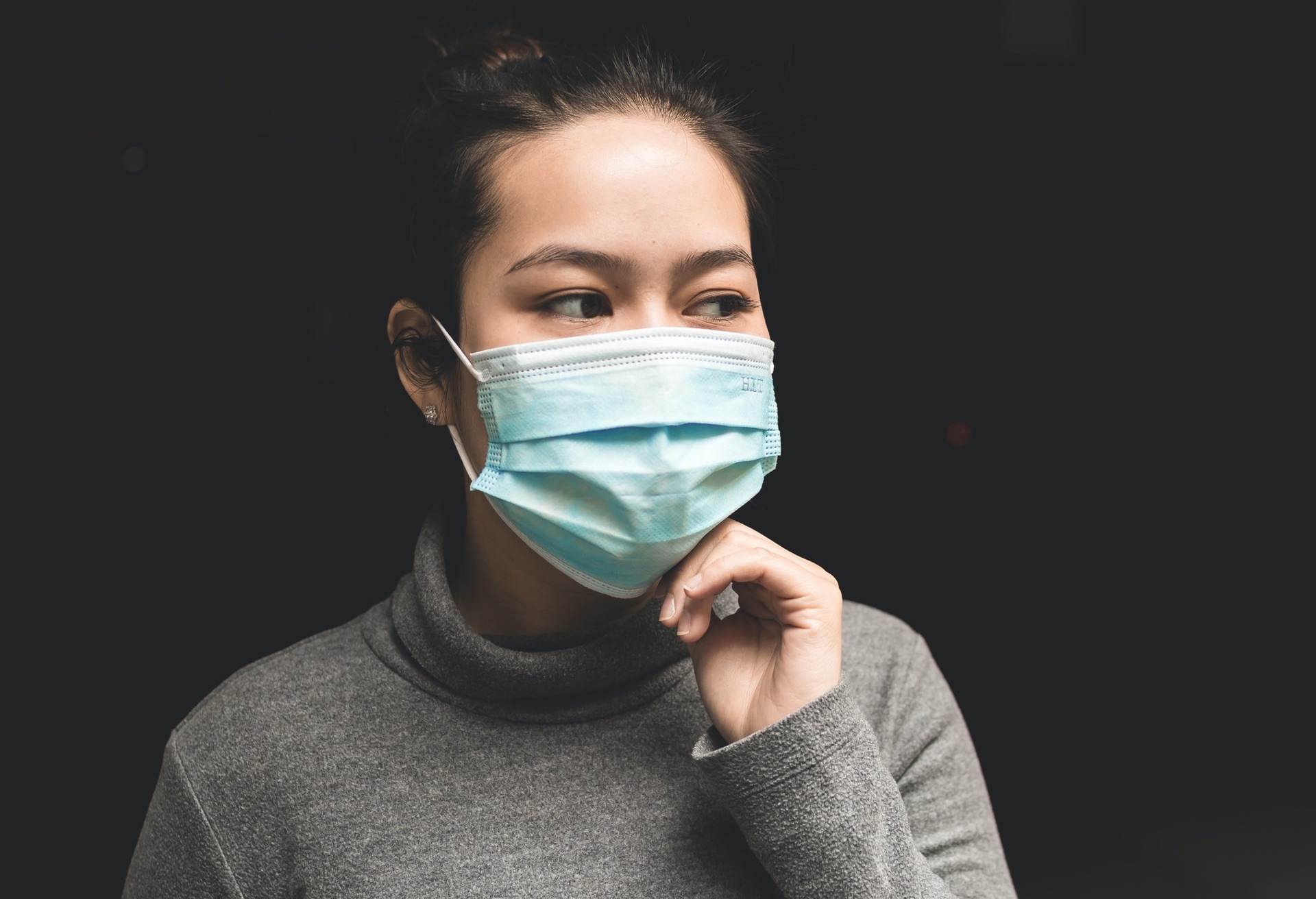 Asian girl wearing face mask.