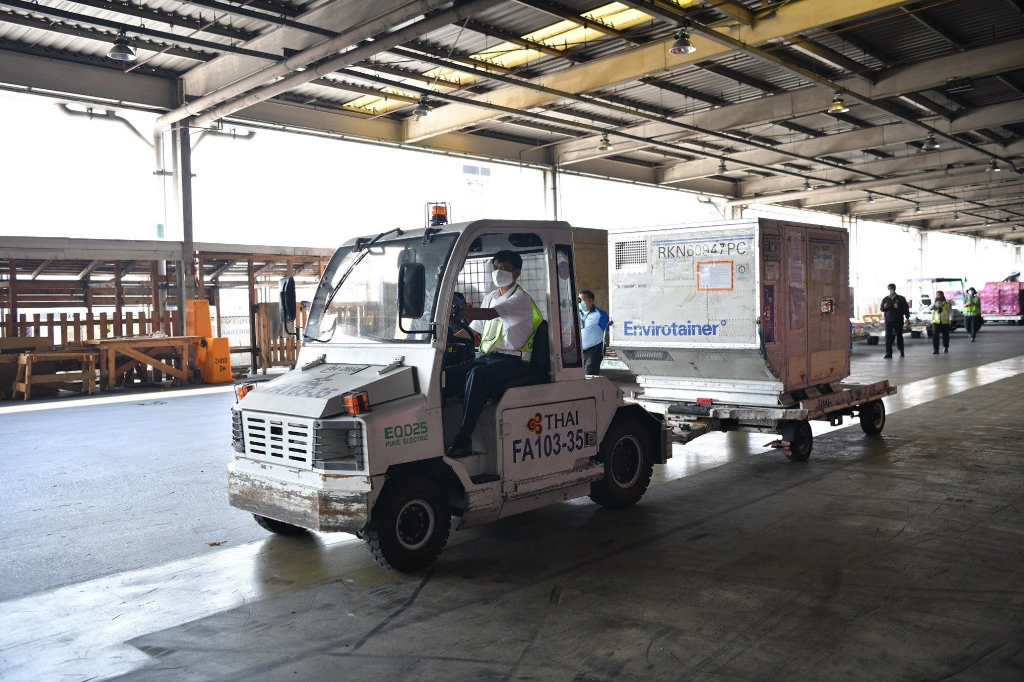 The vaccine being transported to a temperature control room.