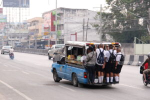 A crowded baht bus (songthaew) on Sukhumvit Road, Pattaya