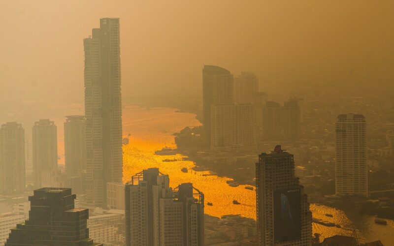 Pollution in Thailand. Smoke haze on the Chao Phraya River in Bangkok.