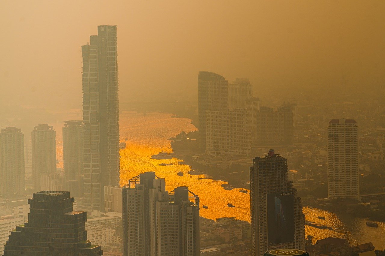 Pollution in Thailand. Smoke haze on the Chao Phraya River in Bangkok.