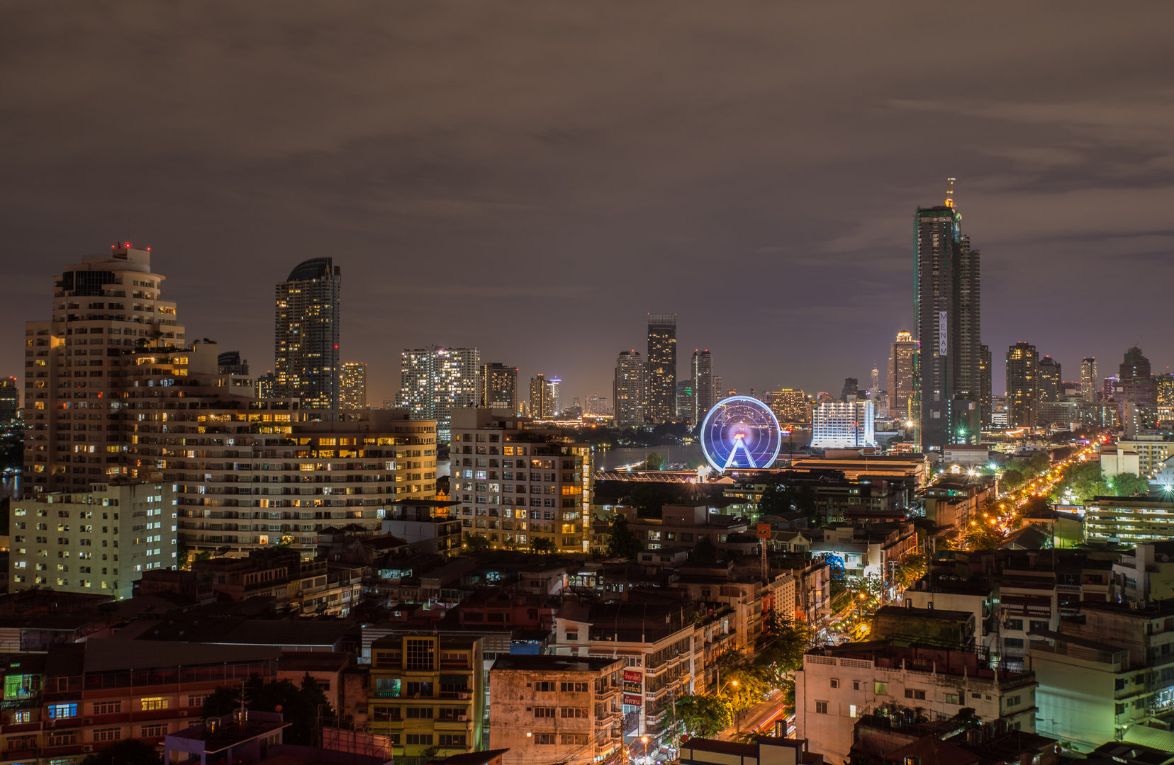 Incredible night view of Bangkok skyline.