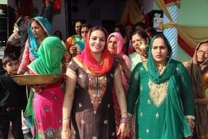 Hindu women attending Bhaat ceremony in India