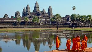 Buddhist monks in front of Angkor Wat temple
