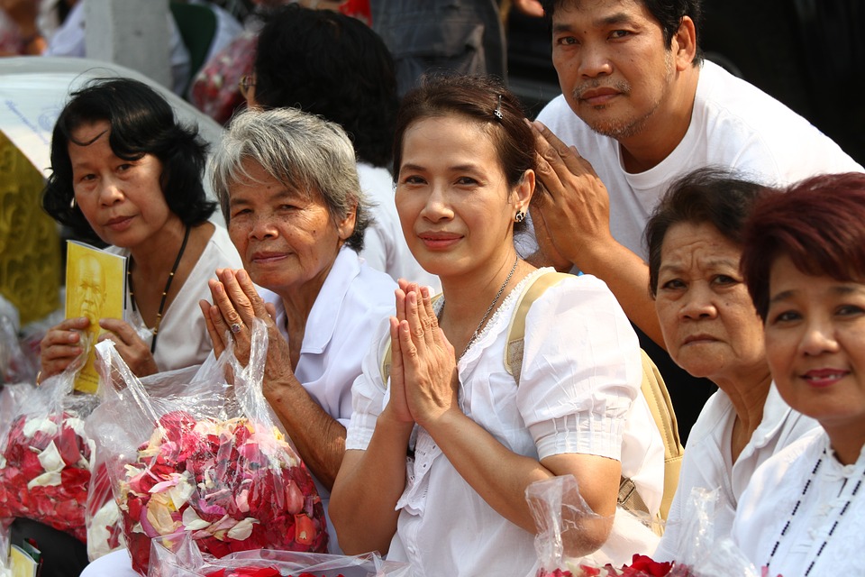 Buddhists praying during a celebration