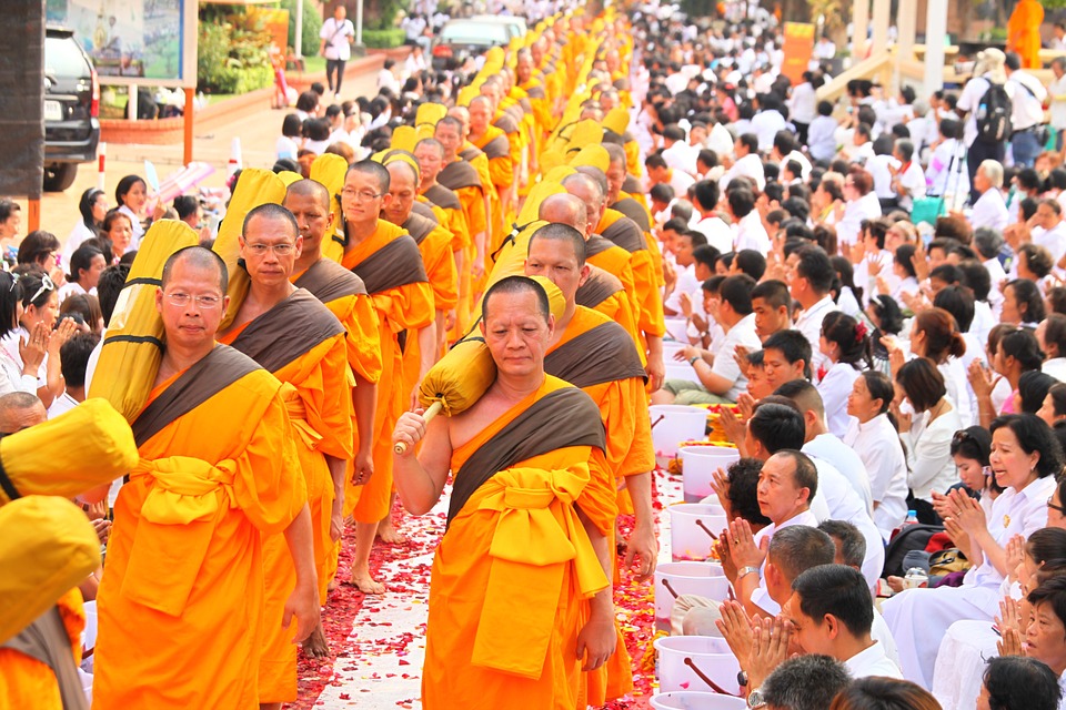 Buddhist monks praying during a ceremony