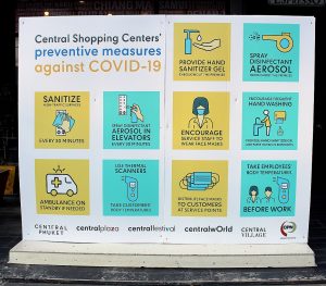 Sign with preventive measures against COVID-19 at entrance to "Central Festival" shopping mall in Phuket