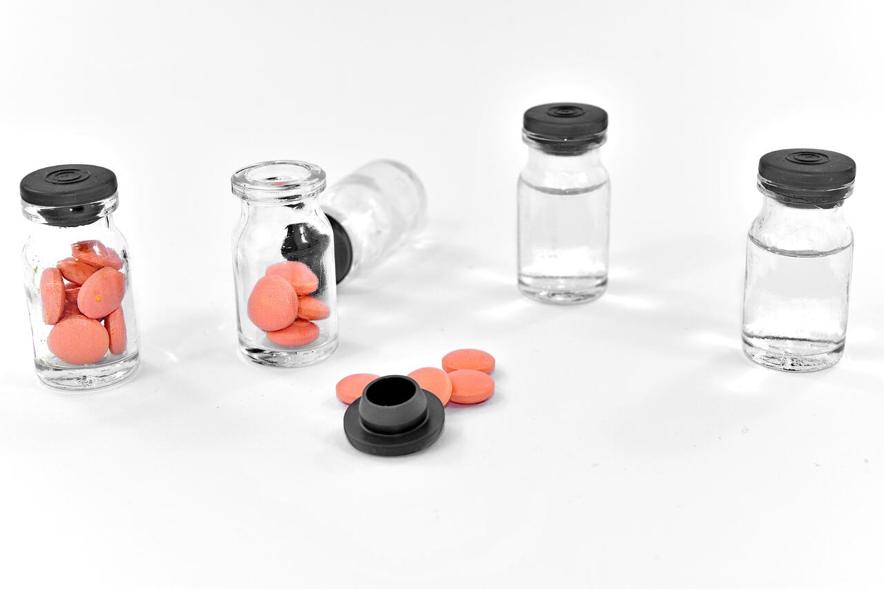 COVID-19 pills inside a transparent canister