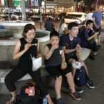A group of Chinese tourists at the Banzaan Night Market in Phuket