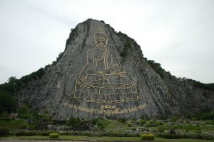 Silhouette of Buddha on the side of Khao Chichan in Chonburi