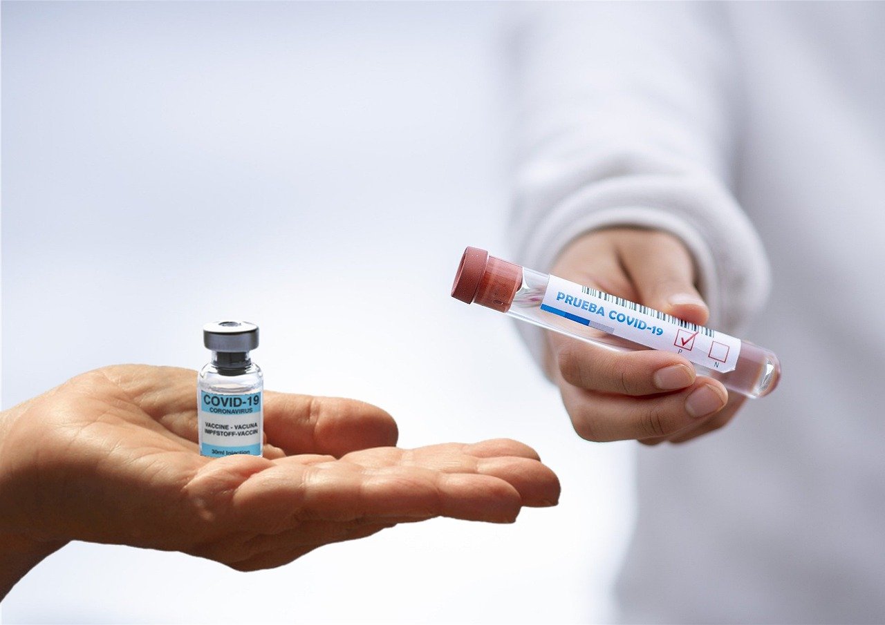 COVID-19 vaccine vial and test tube