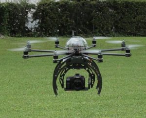 Drone carrying a camera for aerial photography