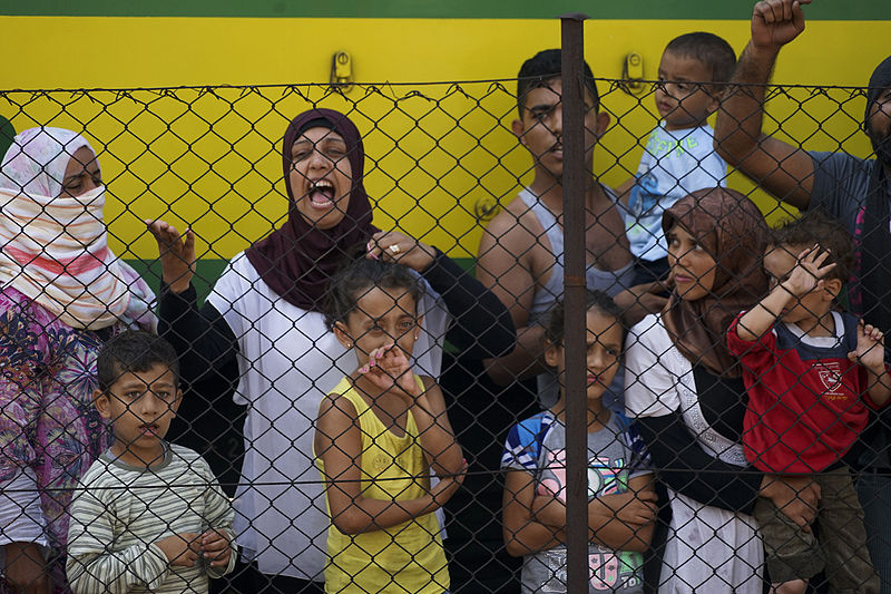 'Syrian refugees' striking at the platform of Budapest Keleti railway