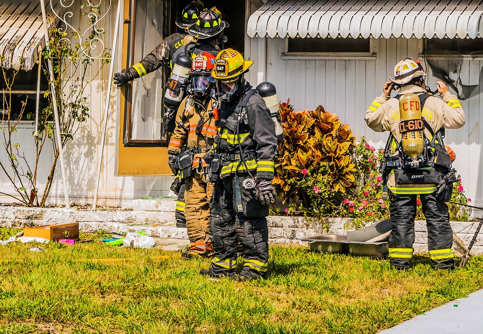 Firefighters after extinguish a fire in a house