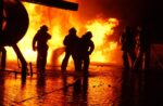 Firefighters extinguishing a fire