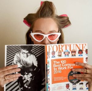 Woman reading the Fortune Magazine