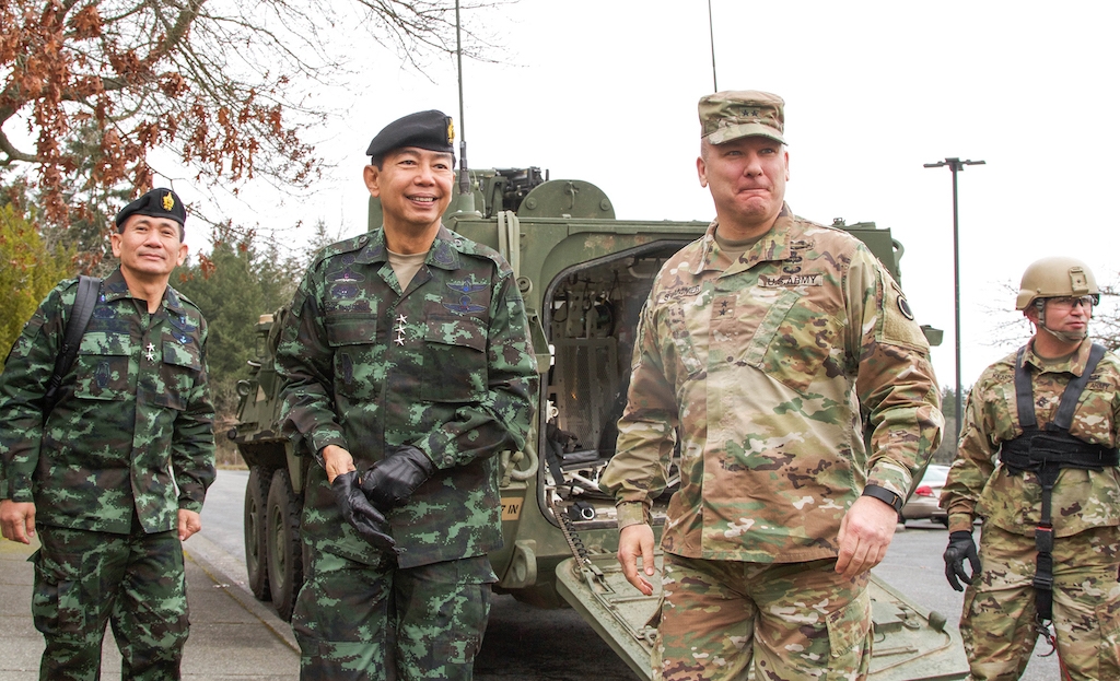 Maj. Gen. Mark Stammer (right), I Corps deputy commanding general, greets Royal Thai Army Lt. Gen. Apirat Kongsompong, First Army Area commander in Thailand