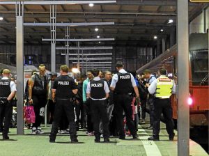 German Police (Polizei) intercept refugees at Munich Central Station