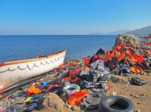 Boat and life jackets belonging to refugees in Lesvos, Greece