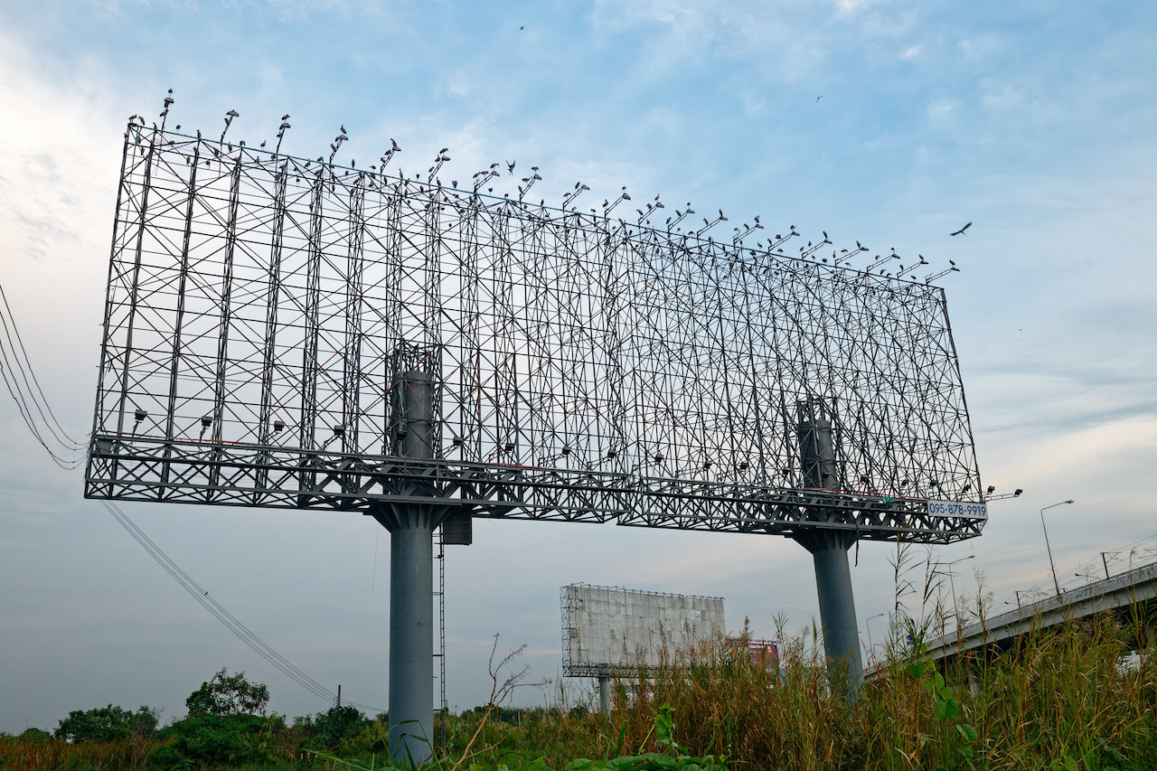 Gigantic billboard on the highway from/to Suvarnabhumi Airport-Bangkok
