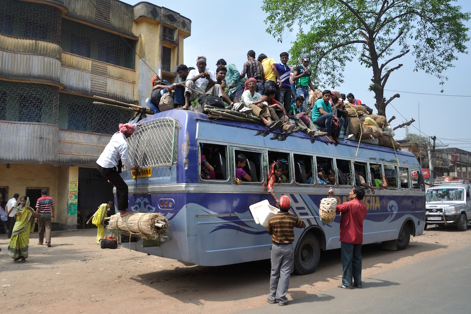 Bus with Passengers on the roof at Indian National Highway 34, Nakashipara-Nadia