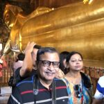 Indian tourists visiting Wat Pho, Temple of the Reclining Buddha in Bangkok