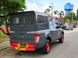 Ford Ranger police car with prisoner compartment in Madiun, Indonesia