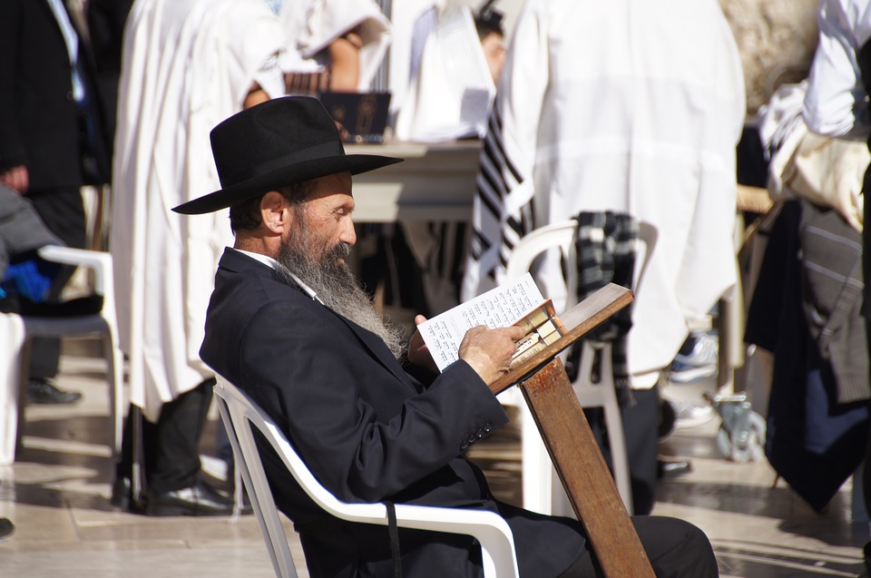 Rabbi reading the Torah in Jerusalem, Israel