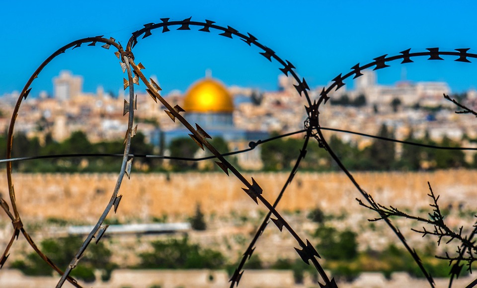 Skyline of Jerusalem with a barbed wire