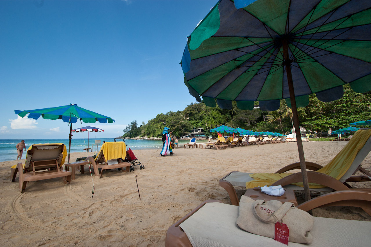 Sun loungers and umbrellas on Karon Beach in Phuket.