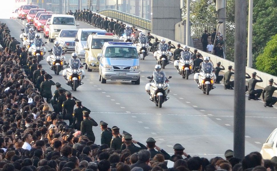 A royal convoy carrying the body of King Bhumibol Adulyadej to the Grand Palace