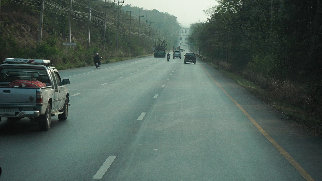 Pickup truck and other vehicles on Mittraphap Road, also known as Highway 2, in Korat, Nakhon Ratchasima Province