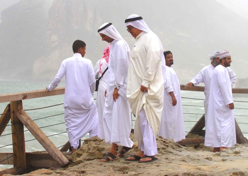 Arab men wearing thawbs