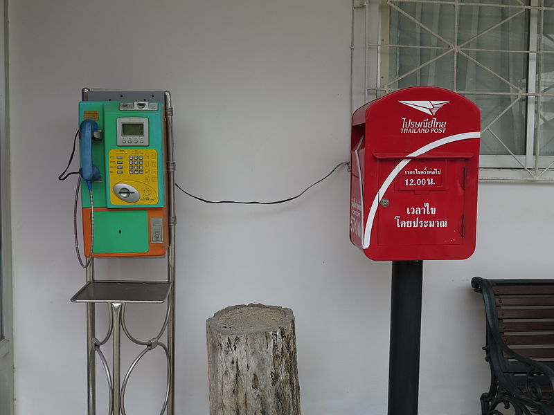 A phone and a post office mailbox
