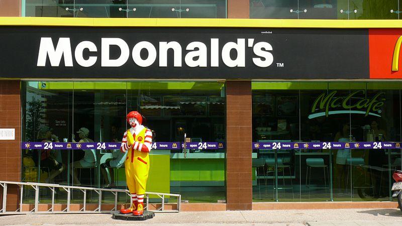 Ronald McDonald waai at McDonald's restaurant in Phuket