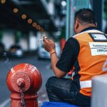 Motorcycle taxi driver in Bangkok.