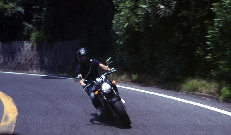 Man Riding a motorbike on the road