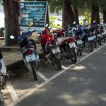Motorcycles parked in the main street of Rawai beach