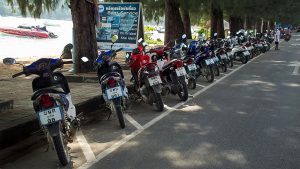 Motorcycles parked in the main street of Rawai beach