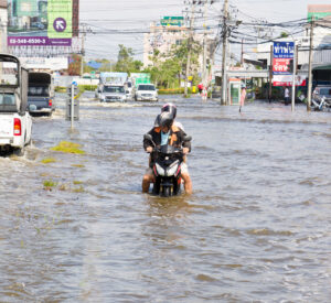 Motorbike on a flooded street in Thailand