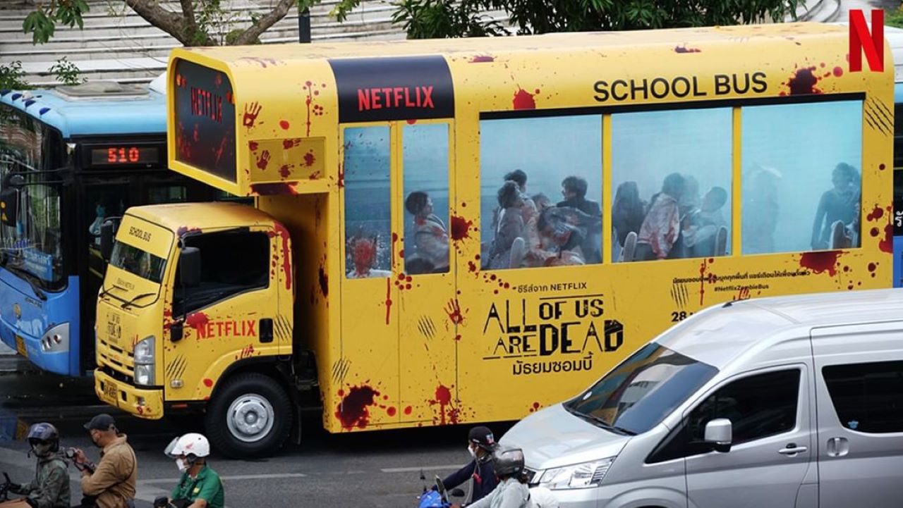 Bloody bus traveling through the streets of Bangkok as a promotion for a new Netflix series on zombies in Thailand