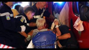 First aid staff assisting wounded woman in Nice