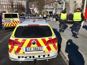 Norwegian police officers and Volkswagen and Mercedes-Benz cars in Bergen, Norway