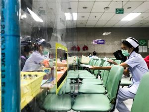 Acrylic shields installed to prevent the spreading of coronavirus and to keep social distance between nurses and patients at the Bangkok Metropolitan Administration General Hospital, a public hospital in Thailand
