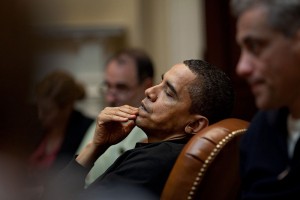 President of the United States of America Hussein Obama reflects during an economic meeting