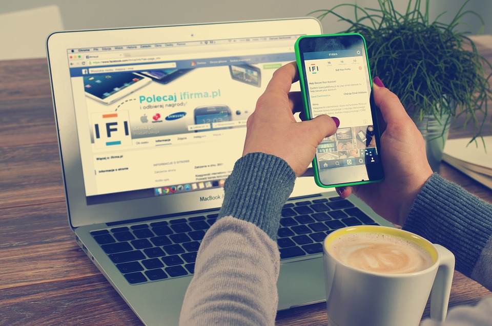 A mobile phone and MacBook Pro