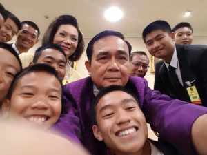 PM Prayut Chan-ocha taking a selfie with the Wild Boars team