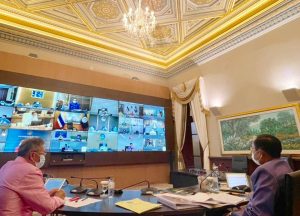 Prayut Chan-o-cha and the Ministry of Public Health executives during a video conference to solve the COVID-19 situation in Thailand